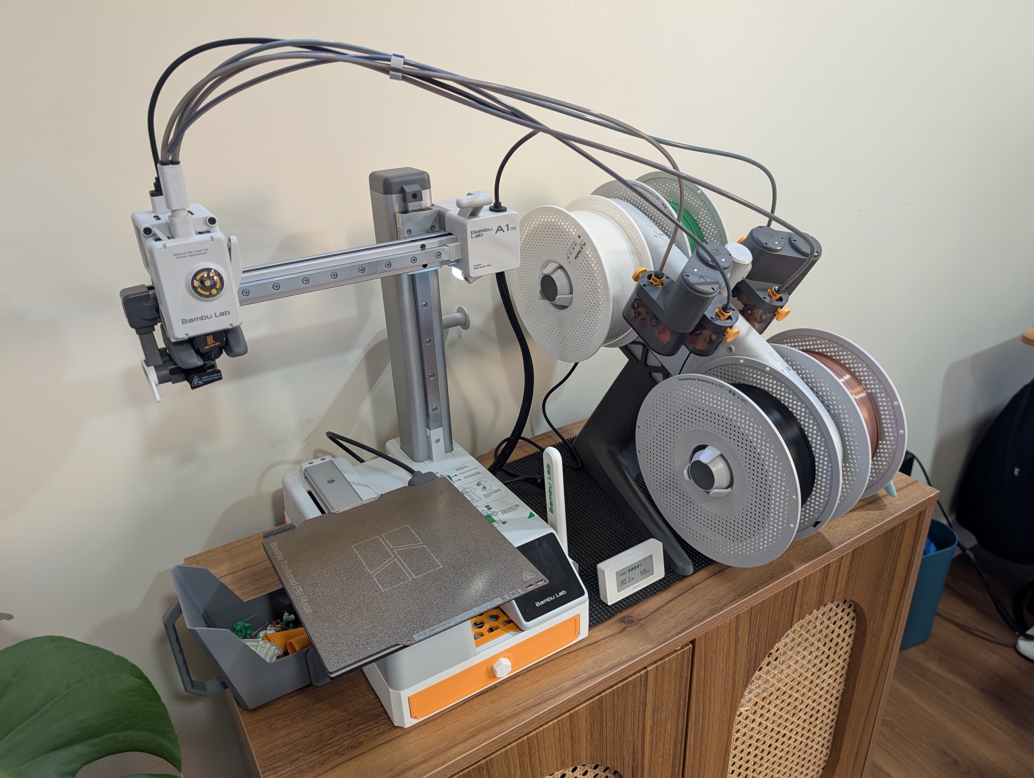 Bambu Lab A1 Mini 3D printer (left) with AMS Lite (right).